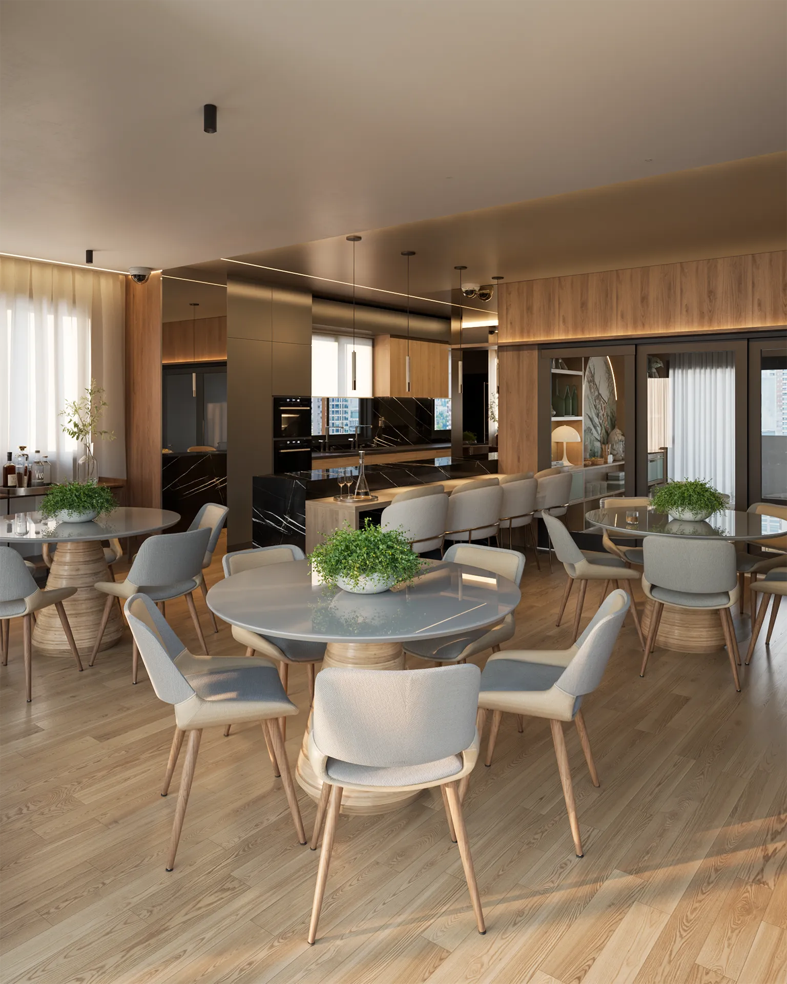 Salão de festas do Liv Green Residence com mesas redondas, cozinha gourmet em mármore preto e piso de madeira em render 3D