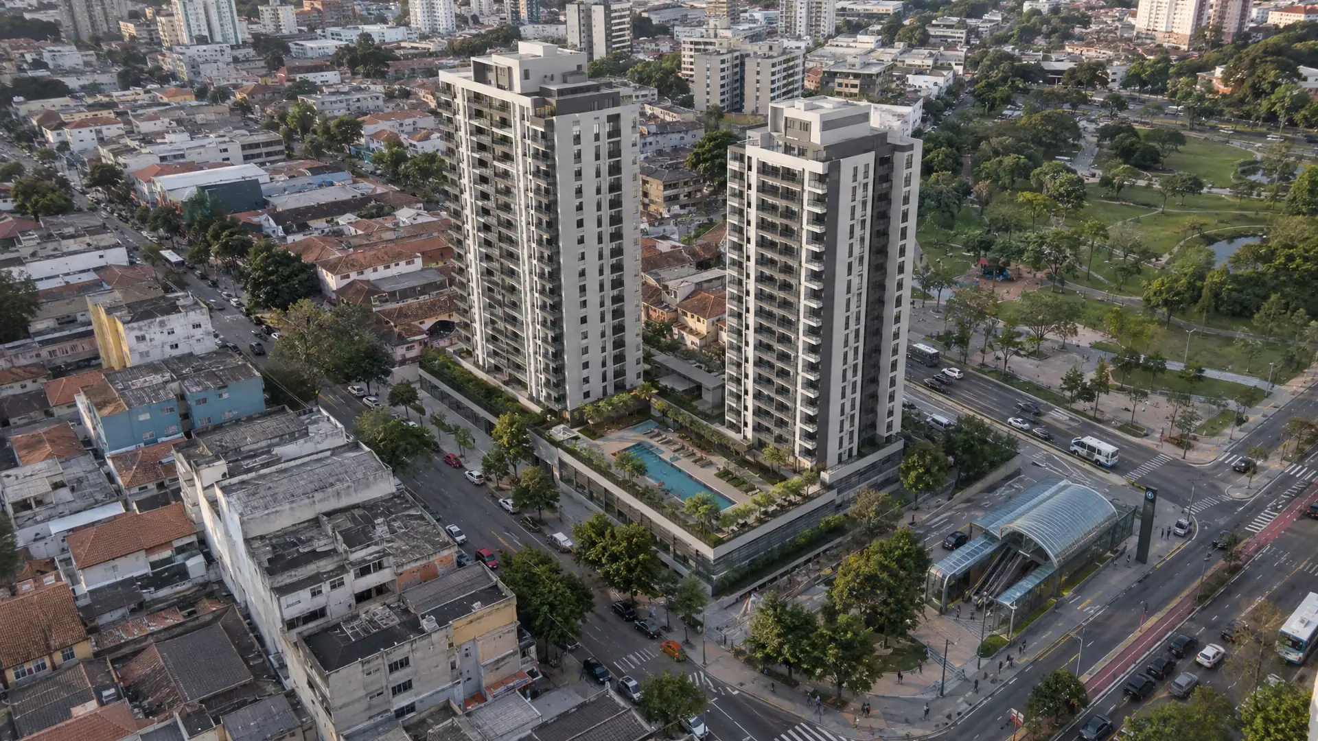 Render 3D ilustrativo aéreo de empreendimento de duas torres integrado ao bairro, ao entardecer