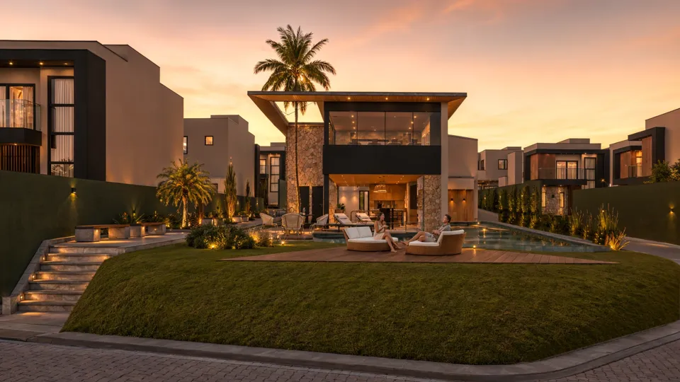 Vista do condomínio Volare ao entardecer, com o clube e as casas, em render 3D